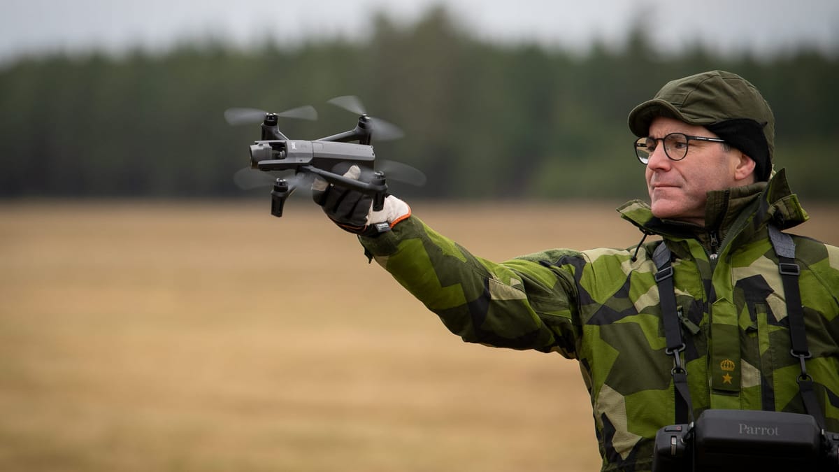  Personnel deploys Parrot drone by hand. Photo: Swedish Armed Forces 