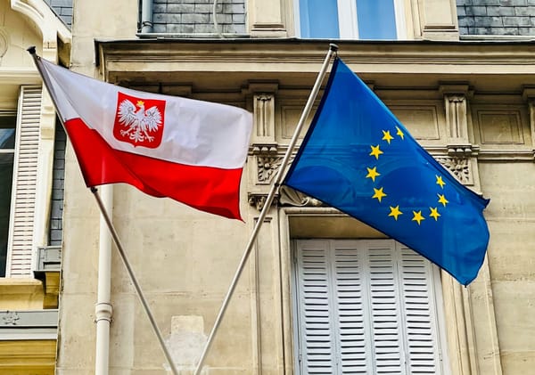 The flags of the Consulate General of Poland and the European Union 